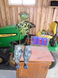 Qty of 2 sitting cement frogs & tin standing. As shown.