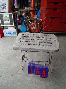 Stand with stone plaque. As shown.