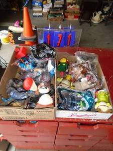 Qty of 2 flats of happy meal toys unsorted. As shown.