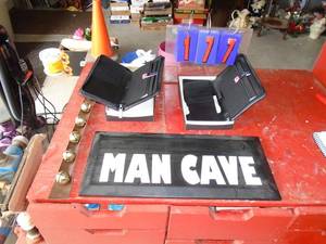 Man cave plaque & 2 new wallet organizers. As shown.