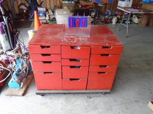 Wood storage cabinet. 12 drawers with contents. As shown.