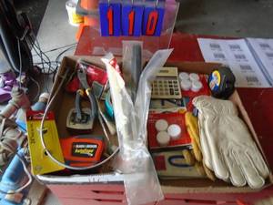 Qty of 2 flats misc pliers, tape measure, gloves. As shown.