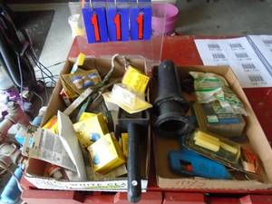 Qty of 2 flats old style fuses, fuse stats, glue gun, glue. As shown.