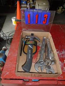 Flat of adjustable wrenches & hammer. As shown.