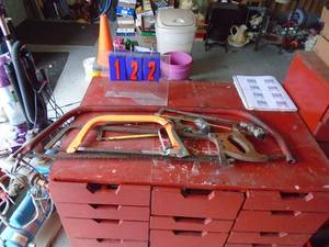 Group of wood, metals, metal saws. As shown.