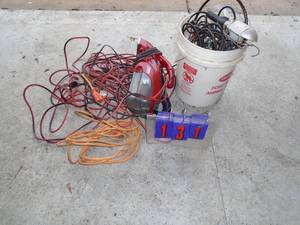 Large qty of extension cords & trouble light. As shown.