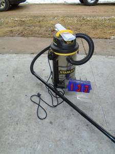 Stainless Stanley vacuum. Looks nearly new. Approx 6 gallon As shown.