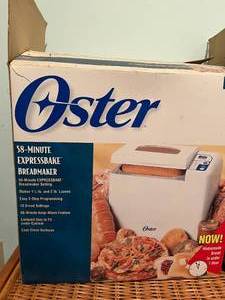 lot 34 image: NEW Oster Bread Machine