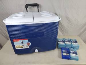 lot 44 image: New - Small Crack - Rolling Rubbermaid Cooler and New Ice Packs