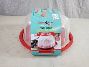 lot 94 image: New Nordic Ware Bundt Cake Keeper and Pan