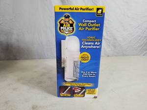 lot 108 image: New Air Police Compact Wall Outlet Air Purifier