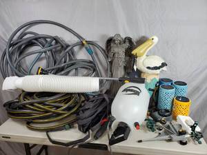 lot 174 image: Assorted Garden Decor, Hoses, Sprayer, Sprinklers, and More
