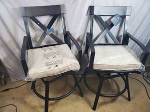 lot 2 image: 2 New Swivel Patio Chairs - See Note