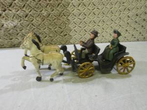 lot 17 image: (EC1) Vintage Cast Iron Horse and P...