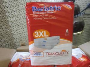 lot 67 image: (EW4) 4 Packs of Disposable Briefs ...