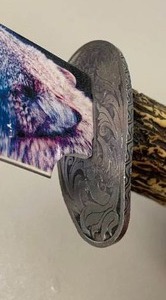 lot 4 image: Large Knife with Wolf Scene and Deer Antler Handle