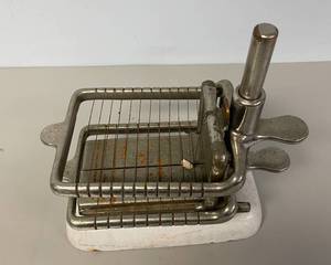 lot 80 image: Vintage Cheese Slicer