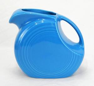 lot 68 image: Large Peacock Disc Pitcher