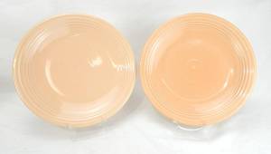 lot 106 image: Two Apricot Chop Plates