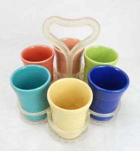 lot 19 image: Six Multicolored Tumblers in Plastic Carrier