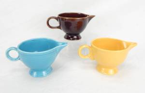 lot 113 image: Vintage Sheffield  Amberstone, Turquoise and Yellow Ring Handled Creamers