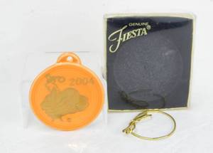 lot 129 image: New 2004 Tangerine with Gold Dancing Lady Ornament
