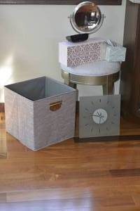 Stool, wall clock, magnification mirror, alarm clock, tote, and Kleenexes