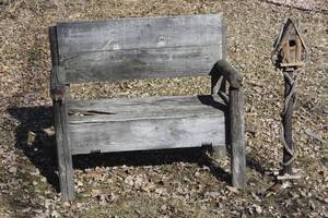 Small outside bench and bird house