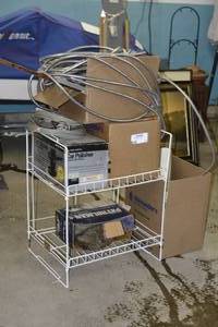 garage hand tools, plumbing fittings and duck decoys