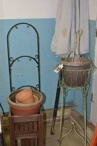 Outdoor Lot Including planters and a patio umbrella