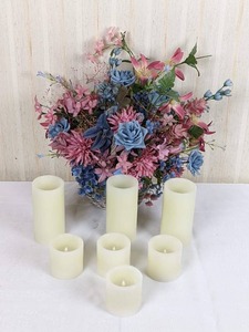 Assortment of Electric Candles and Basket with Artificial Flowers