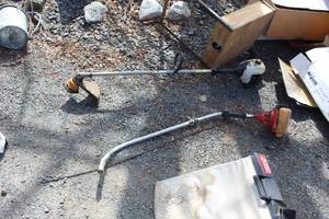 lot 470 image: Ryobi 767f 31cc 16 Line Trimmer, Homelite Weed Whip (Parts Only)