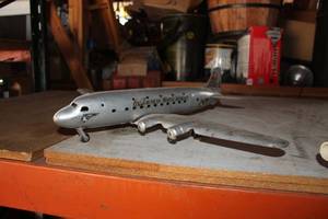 lot 399 image: Pan American World Airways Metal Airplane Table Dcor