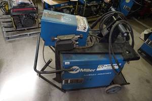 lot 13 image: Miller Dimension 302 CCCV-DC Welding Power Source with 70 Series Wire Feeder