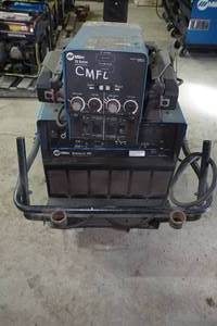 lot 17 image: Miller Dimension 302 CCCV-DC Welding Power Source with 70 Series Wire Feeder