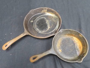 2 CAST IRON PANS