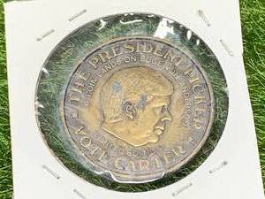 lot 50 image: Presidential Picker Carter  Reagan Coin