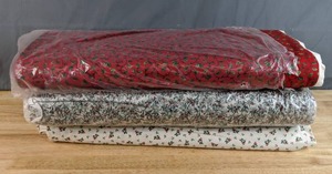 lot 136 image: Collection of 3 Christmas Holly Themed Fabric Bolts - Z