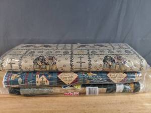 lot 65 image: Collection of The Birth of Jesus, Cross, and Animal Themed Bolts of Fabric - Z