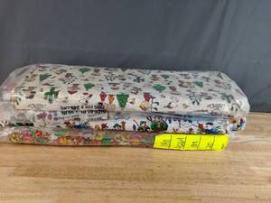lot 39 image: Collection of A Charlie Brown Christmas and Christmas Themed Bolts of Fabric - Z