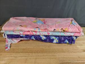 lot 18 image: Disney Princesses, Strawberry Shortcake, and Disney Tinkerbell Printed Bolts of Fabric - Z
