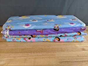 lot 24 image: Collection of Dora The Explorer Themed Bolts of Fabric - Z