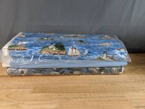 lot 26 image: Collection of Outdoor Lakes, Ducks and Solid Light Blue Themed Bolts of Fabric - Z