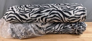 lot 194 image: Two Bolts of Zebra Print Fleece Fabric - Z