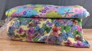 lot 200 image: Two Bolts of Pastel Butterfly Fleece Fabric - Z