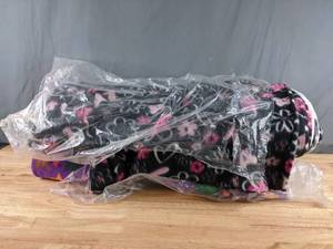 lot 204 image: Two Bolts of Multicolored Fleece Fabric (Flowers & HeartsStars) - Z