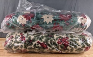 lot 537 image: Two Bolts of Fleece Fabric (PoinsettiasCardinals) - Z