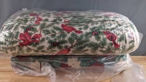 lot 547 image: Two Bolts of Holiday Poinsettia & Cardinal Fleece Fabric - Z