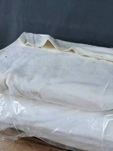 lot 521 image: Three Bolts of Fabric - Two Off-White and One Bluegreen