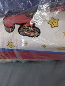lot 519 image: Three Bolts of Fabric - Super Mario Brothers Print, Blue, White